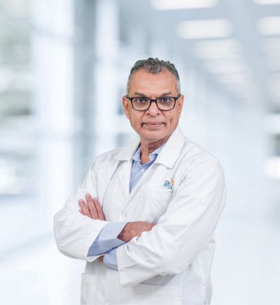 Dr Mani C S